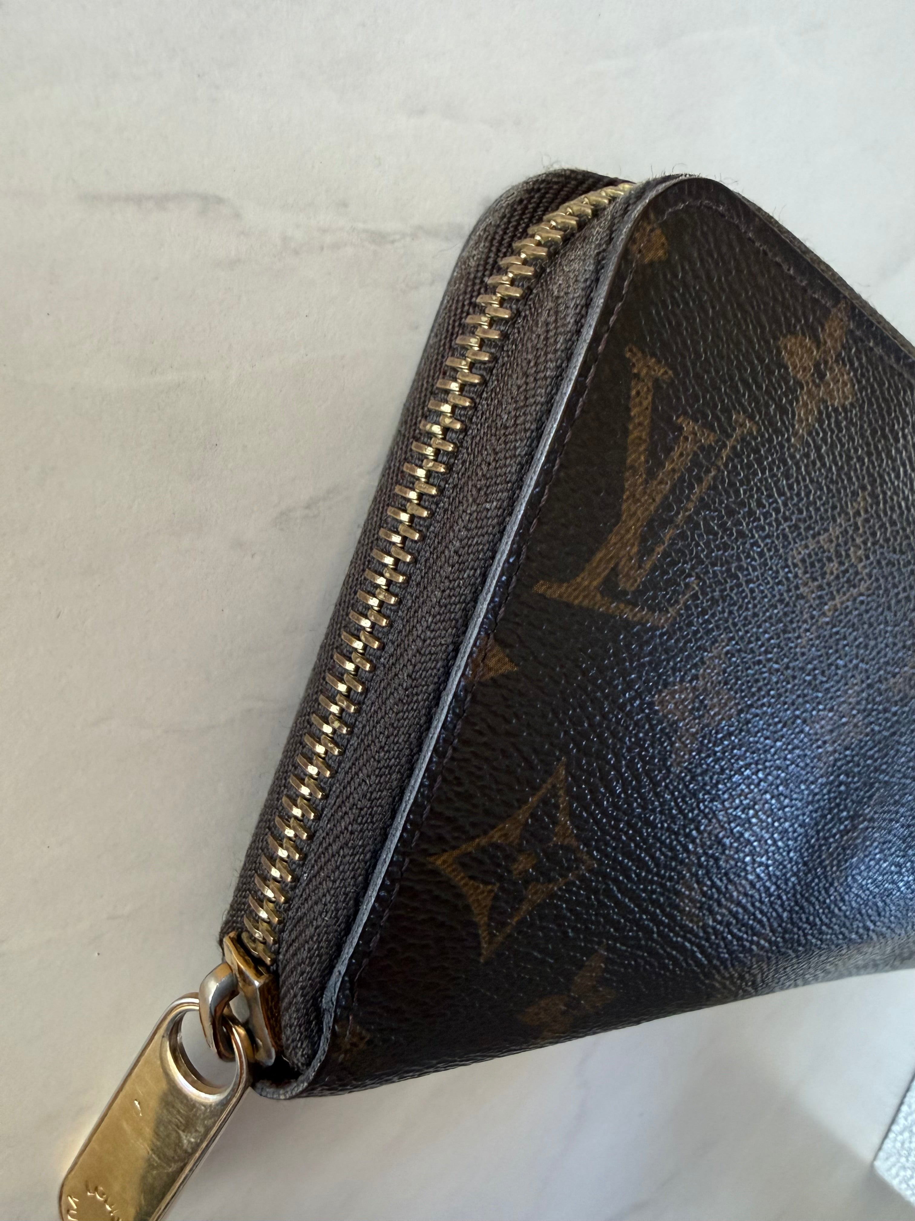 Preloved Louis Vuitton Long Zippy Wallet