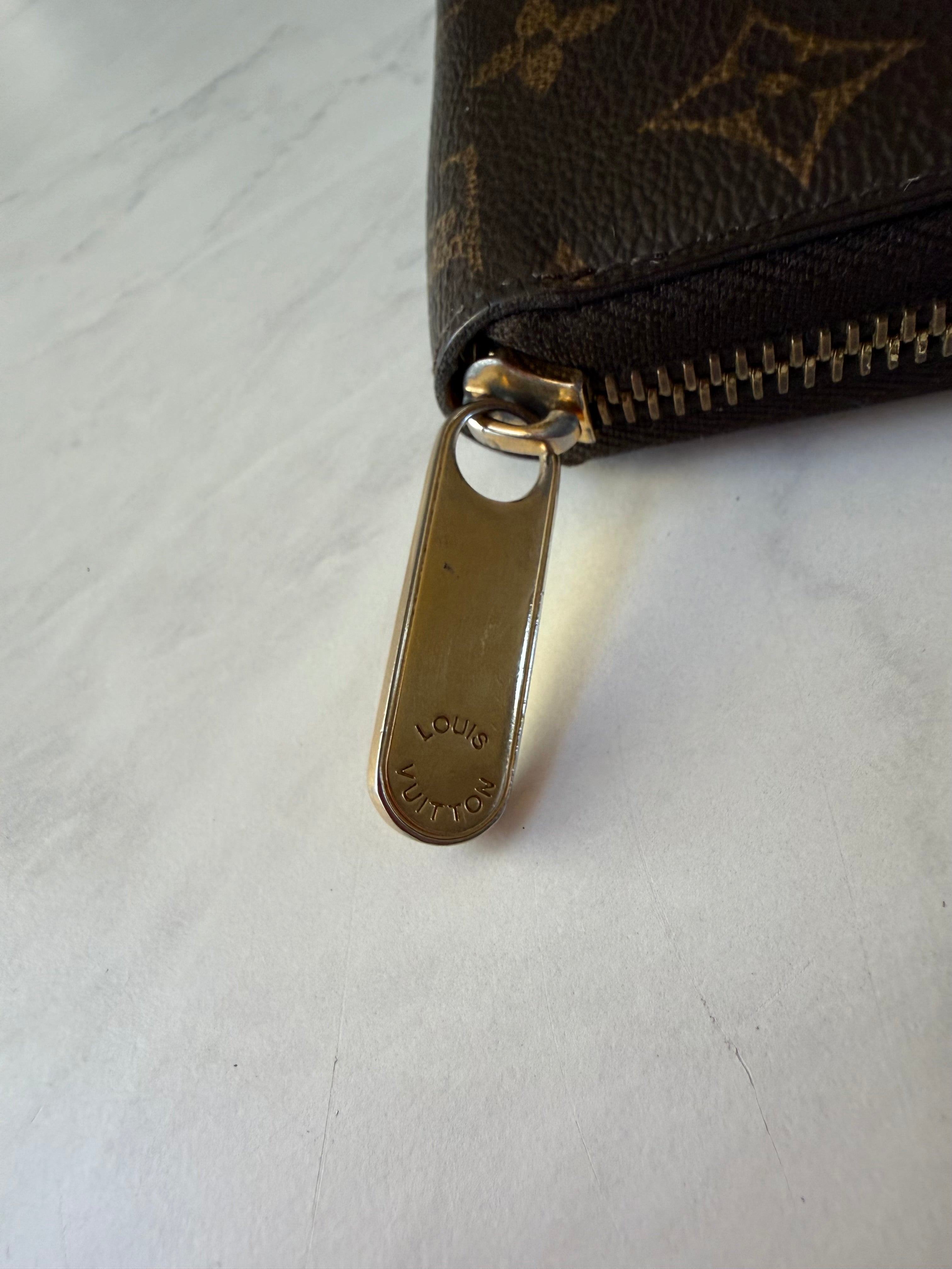 Preloved Louis Vuitton Long Zippy Wallet